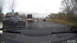Moped rider uses mobile phone whilst riding