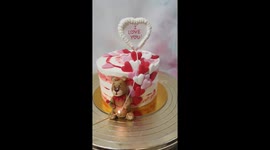 Marriage proposal with burnaway cake.Heart on fire reveals proposal and engagement ring