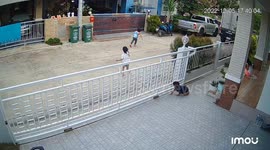 Toddler's fingers trapped in sliding metal gate