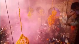 Devotees drenched in the joy of colors celebrate Holi in Braj