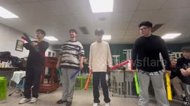 Students produce enchanting melody with plastic sticks in China