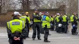 Israeli embassy seald off by British police as thousands of pro-Palestine protesters march towards it in London