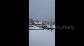 US: Fast-Moving Snowstorm Sweeps Through Northeast