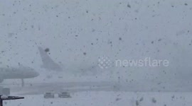 US: Fast-Moving Snowstorm Sweeps Through Northeast 2