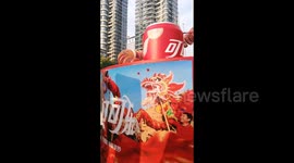 The Coca-Cola Dragon installation on a street in Yichang, China