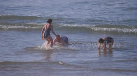 UK Weather, Last day of the Half Term holiday, beachgoers get a taste of spring Fistral Beach, Newquay, Cornwall, UK