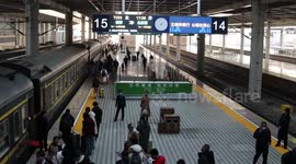 Passengers Board Train To Beijing in Xi 'an, China