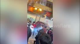 Driver, 44, dragged out of car by police and passerby during traffic rampage