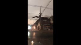 Strong wind tears off family's roof in Thailand
