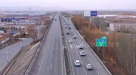 Vehicles Travel Slowly at Expressway in Jiuquan, China