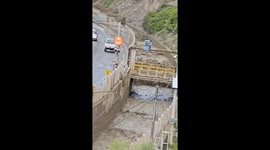 Flooded river canal in La Paz, Bolivia: video captures rising waters and road overflow