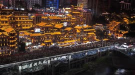 Tourists enjoy the night view in Chongqing, China