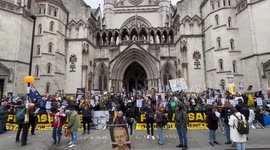 Julian Assange supporters protest outside British High Court as he appeals against extradition to US