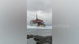 Dozens rescued off stranded ferry that runs aground after engine failure