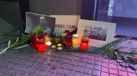 Candles and flowers for Alexei Navalny laid outside Russian consulate in Greece