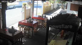Three teenagers on motorbike crash into noodle restaurant