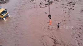 Crane used to lift residents trapped by raging floodwater in northern India