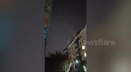 Mysterious glowing dots flying over city spark alien speculation