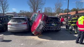 Car Ends Up Sandwiched Between SUVs In Crash in Wellesley, USA