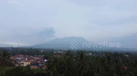 Mount Marapi spews colomns of volcanic ash during an eruption as seen from Tanah Datar District, West Sumatra, Indonesia on February 21, 2024. Following the eruption of the volcano that killed 24 people on 3 December 2023.