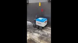 Stand and deliver! Delivery robots have intense showdown on narrow sidewalk