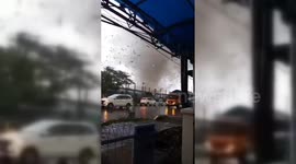 Violent tornado sends debris whirling into air above Indonesia's West Java