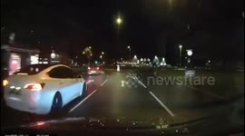 Heartstopping footage shows speeding car flying over roundabout