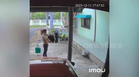 Husband caught on CCTV joking around with wife's bra