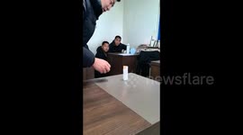 Employee Amazes Colleagues with Paper Magic Trick in Yulin, China