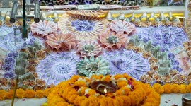 Devotees decorated Hindu deity statue with currency in India