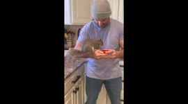 Husband Shares Snacks With Squirrel
