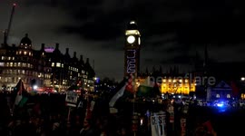 Pro-Palestine and Julian Assange projections appear on the Elizabeth Tower as Parliament descends into chaos over ceasefire vote