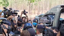 Husband who 'murdered wife then burned body' taken on perp walk to re-enact crime