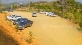 Pickup rolls off cliff after driver forget to set handbrake