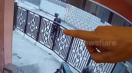 Man caught on CCTV stealing a scooter from a terrace in Indonesia