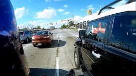 Motorcyclist documents distracted driver's dangerous behavior