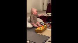 Baby Belly Laughs At Book