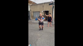 Boy Smiles Big While Playing Jump Rope With Dad