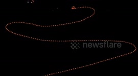 Spectacular bench dragon dance illuminates night in China