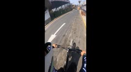 Bicycle collision: hand greeting mishap in Lima, Peru
