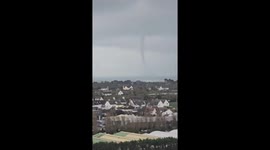 INSANE tornado-like funnel cloud caught by passenger landing in Jersey