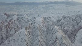 Snow And Ice Cover The Ken Swart Reservoir in Xinjiang, China