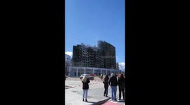 Aftermath footage shows apartment block totally blaze and smokes still engulfing