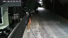 Motorcycle rider and pillion crashes into home's gate