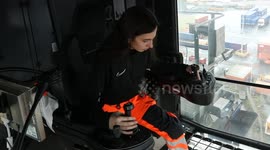 Britain's youngest female crane operator towers above her peers