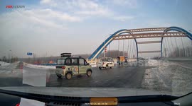 Three vehicles synchronise comical skid-turn manoeuvre on slippery road in central China