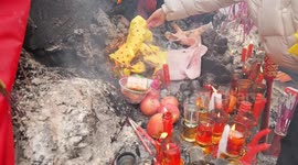 Pilgrims Worship Sacred Stone in Enshi, China