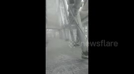 China's tallest skyscraper summit frozen over in spectacular icy encounter amid cold wave