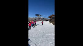 Ski Lift Rider Misses Dismount and Knocks Her Companion Down