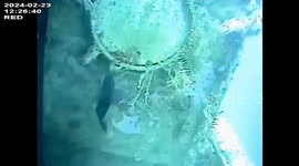 Divers explore control room of sunken HTMS Sukhothai warship in Thailand